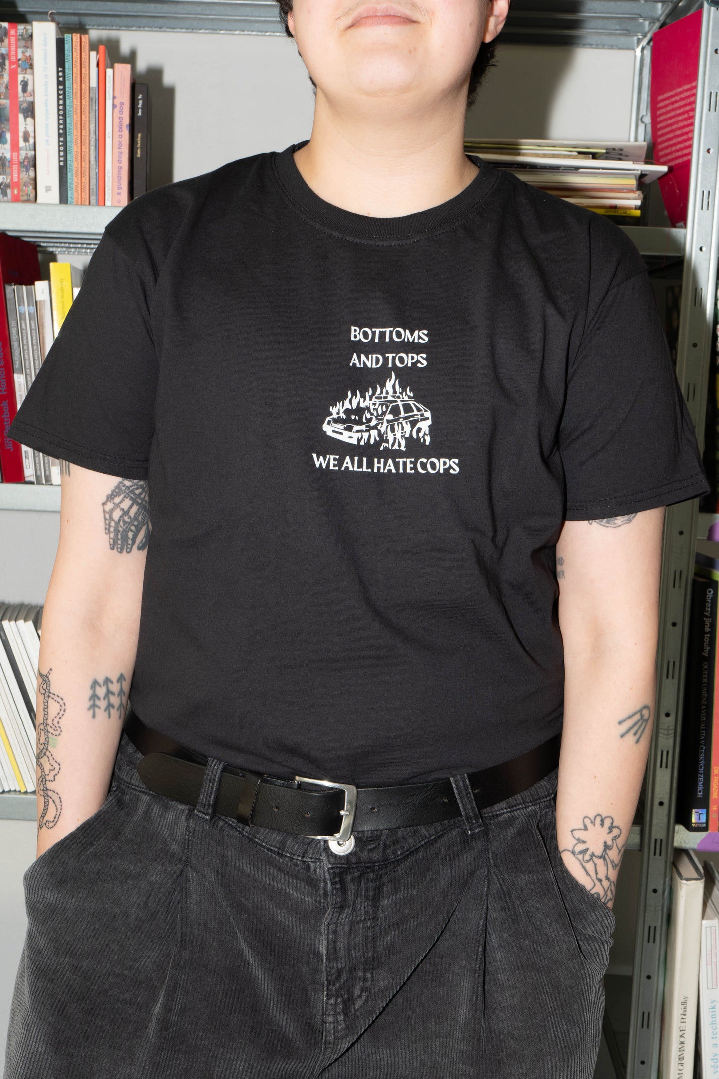 BOTTOMS AND TOPS WE ALL HATE COPS t-shirt